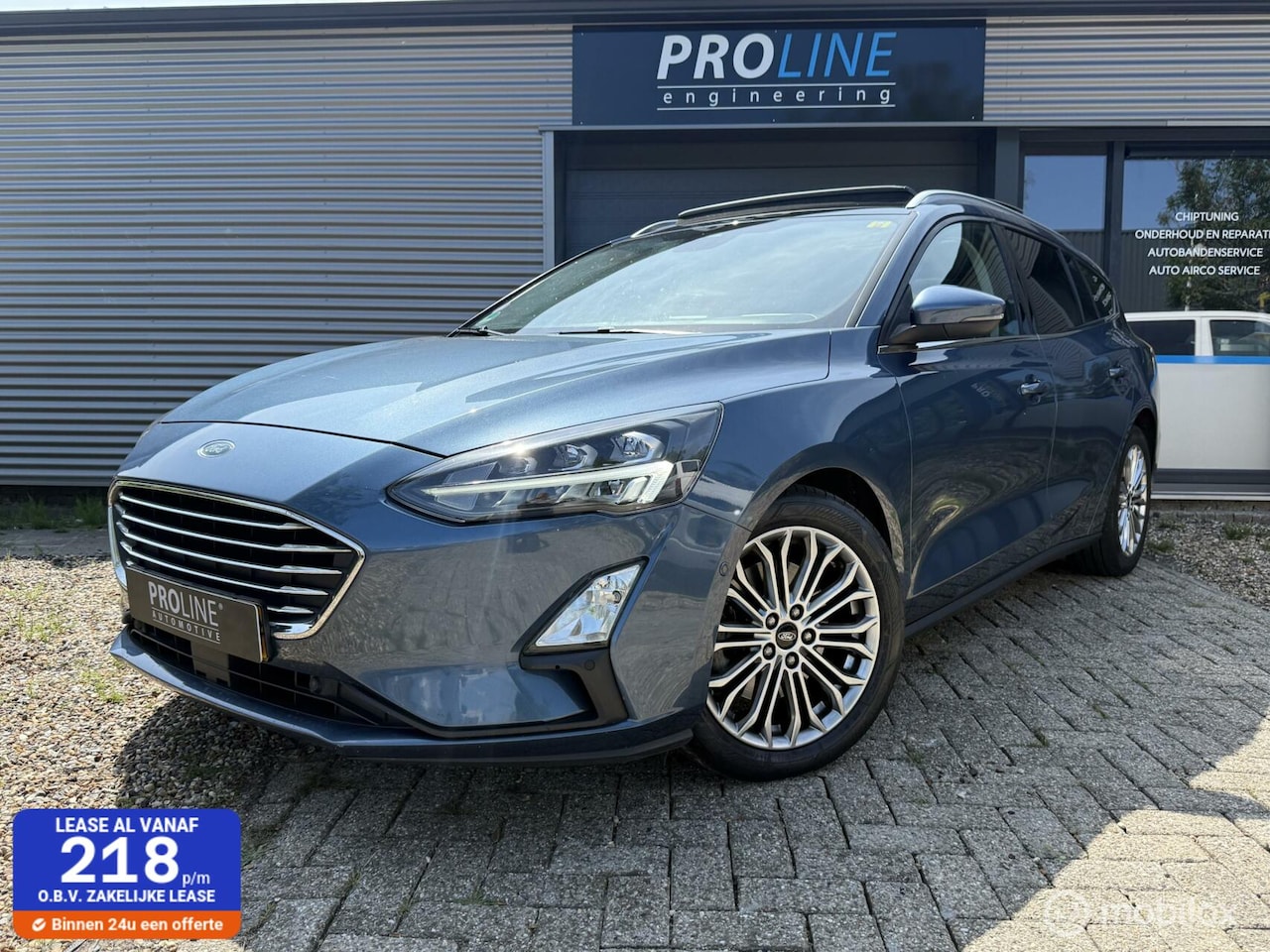 Ford Focus Wagon - 1.0 EcoBoost Titanium Business/PANO/HEAD-UP - AutoWereld.nl