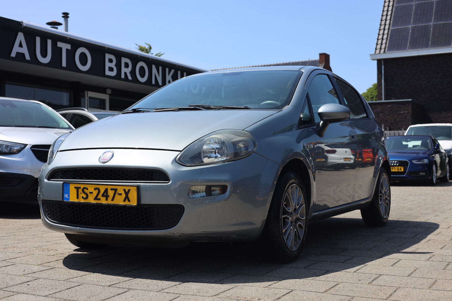 Fiat Punto Evo - 1.2 POP | AIRCO | BLUETOOTH | PDC | 15 INCH - AutoWereld.nl