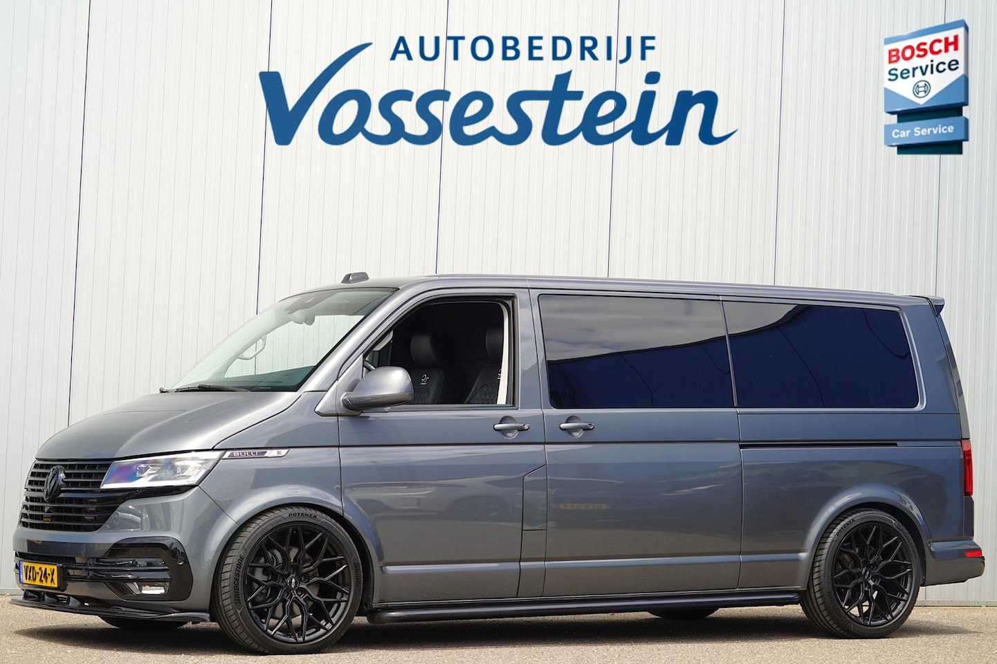 Volkswagen Transporter - 2.0 TDI L2H3 32 Bulli / 16dkm NAP / Bilstein / 20" LMV / Camera / Navigatie / Elek. Klep - AutoWereld.nl