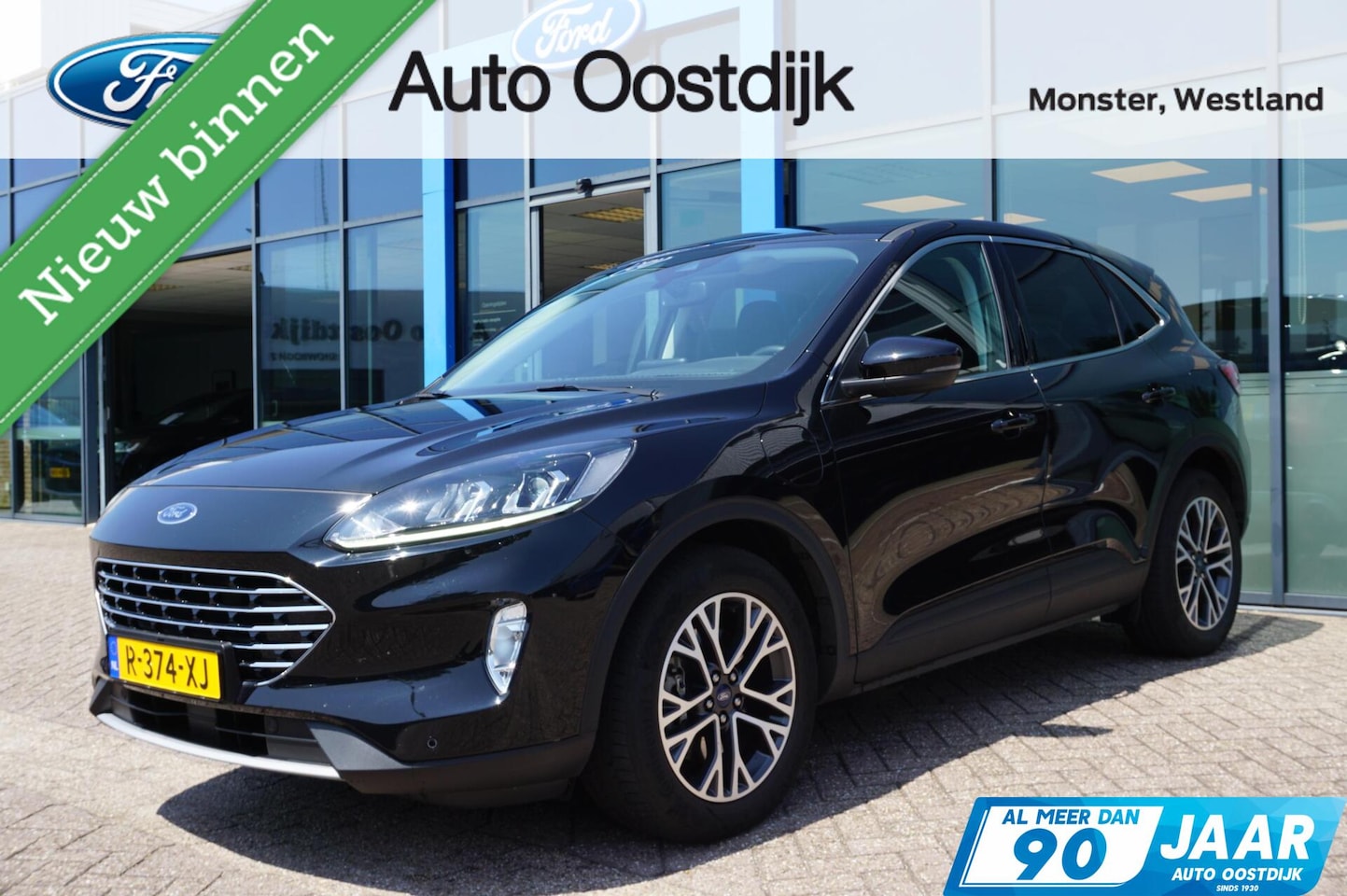 Ford Kuga - 2.5 PHEV Titanium 225PK Winterpack Climate Cruise Parkeersensoren Privacy Glass Navi Carpl - AutoWereld.nl