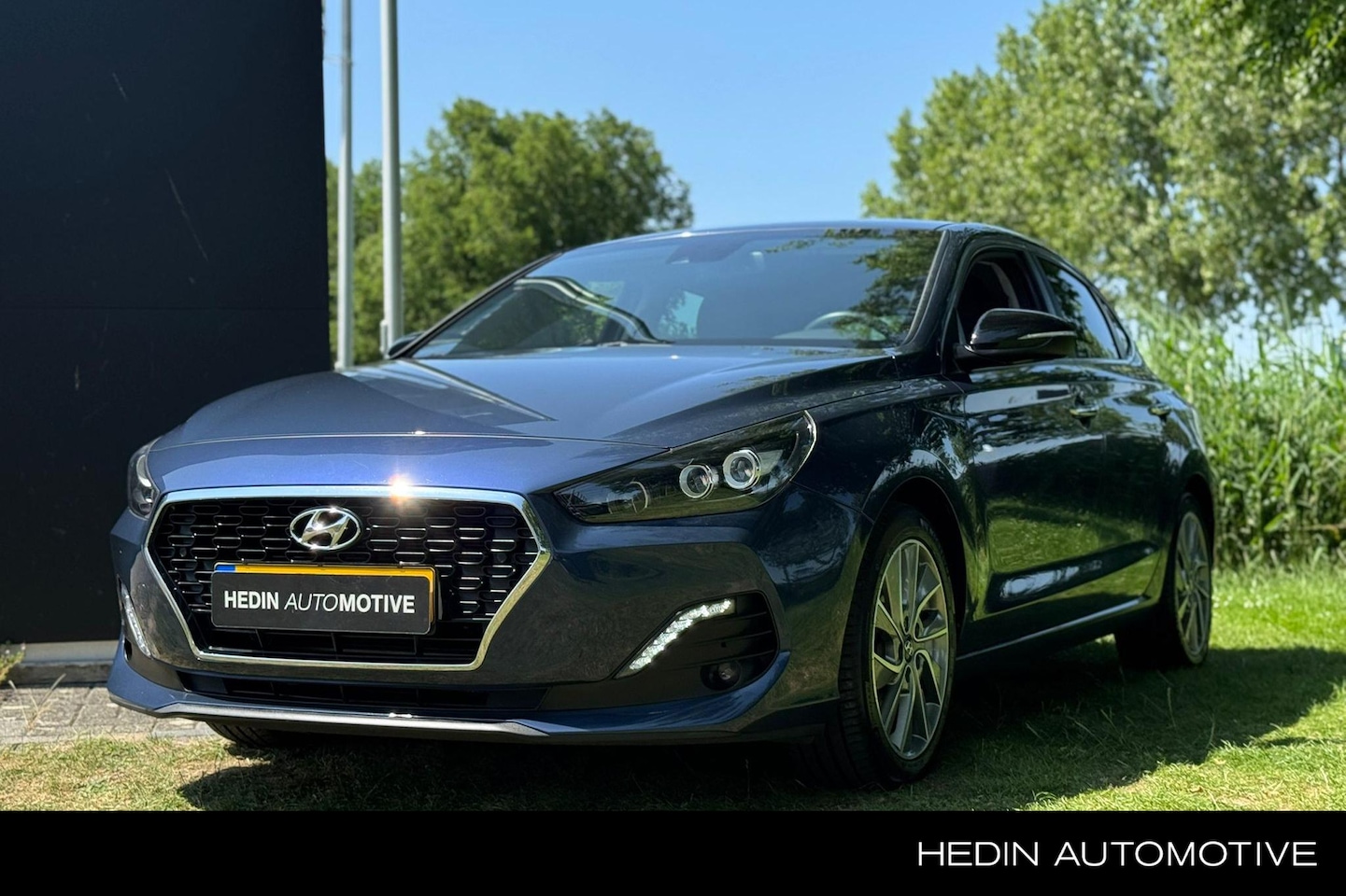 Hyundai i30 Fastback - 1.4 T-GDI Premium | Aut. | Climate Control | Camera | Navigatie | Parkeersensoren | Half L - AutoWereld.nl