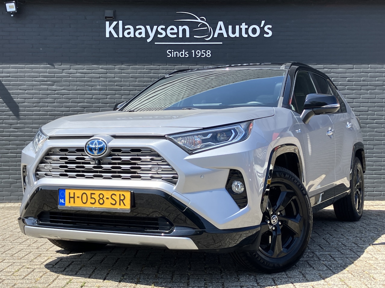 Toyota RAV4 - 2.5 Hybrid AWD Bi-Tone AUT. | 1e eigenaar | 360 gr. camera | navigatie | panoramadak | JBL - AutoWereld.nl