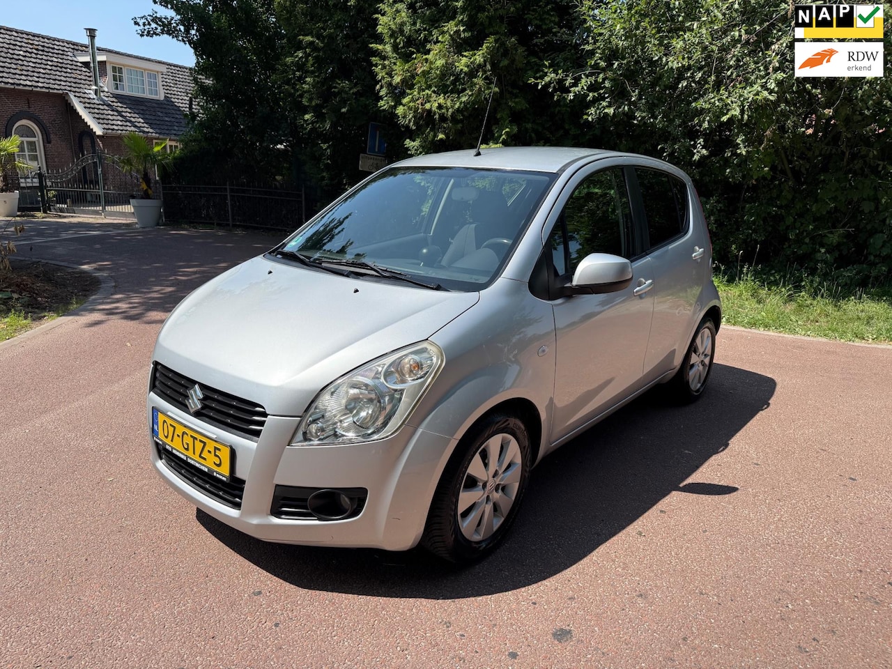 Suzuki Splash - 1.2 Exclusive / Airco / Aux / Lm / Apk / Trekhaak - AutoWereld.nl