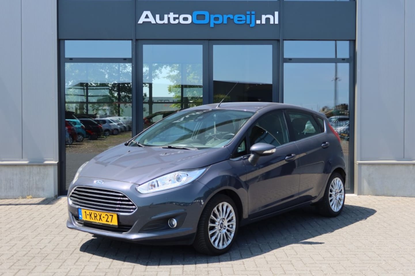 Ford Fiesta - 1.0 Ecoboost 101pk 5drs. Titanium Clima, NAVI, Cruise, PDC, LM-Velgen - AutoWereld.nl