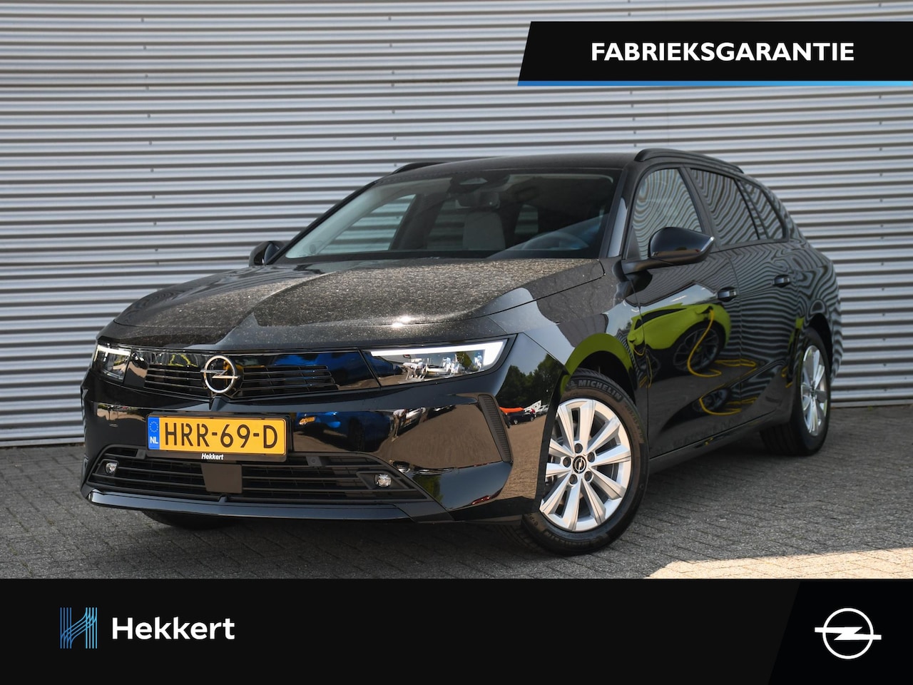 Opel Astra Sports Tourer - Business Edition 1.2 Turbo 110pk PDC + CAM. | 16''LM | ADAPT. CRUISE | NAVI | DAB | APPLE- - AutoWereld.nl