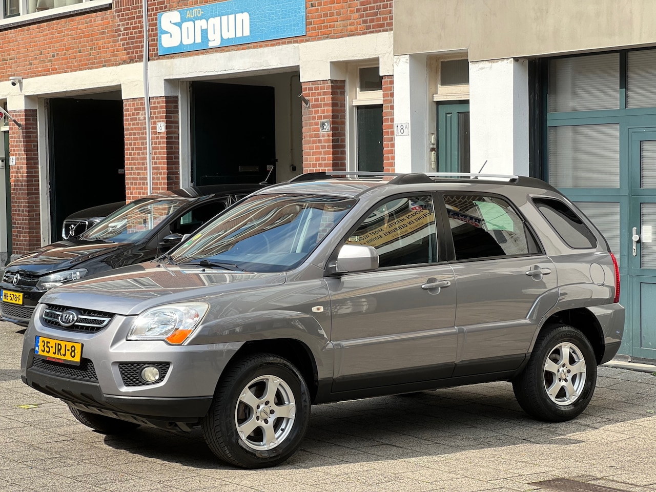 Kia Sportage - 2.0 CVVT X-ecutive-nette auto-dealer onderhouden - AutoWereld.nl