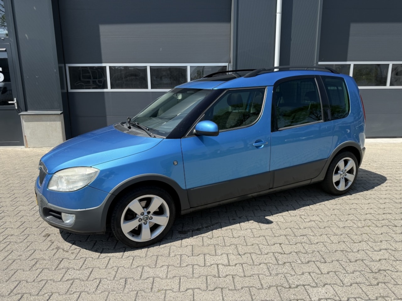 Skoda Roomster - 1.6-16V Scout PANO Airco - AutoWereld.nl