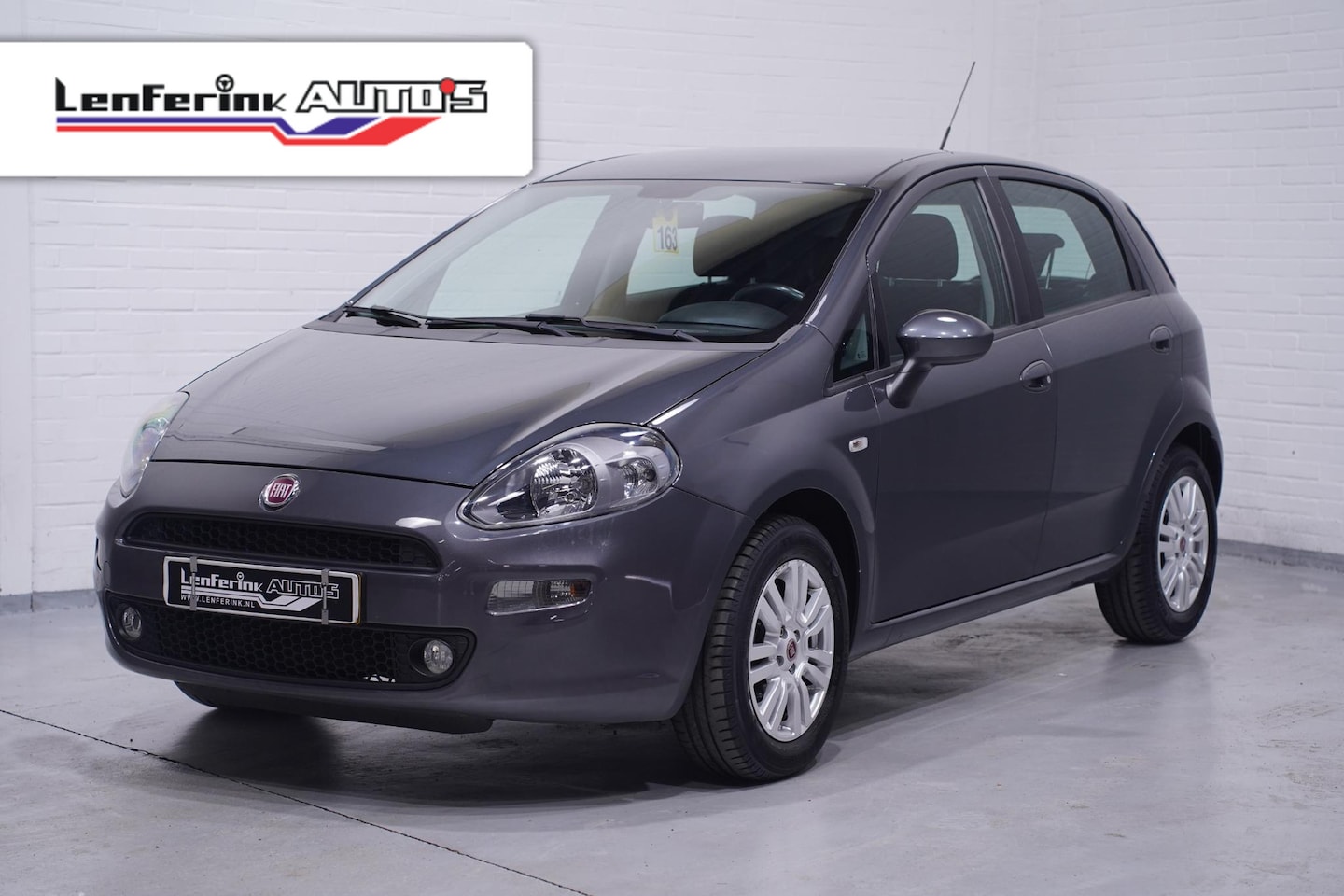 Fiat Punto Evo - 1.2 Street Airco Sportstoelen - AutoWereld.nl