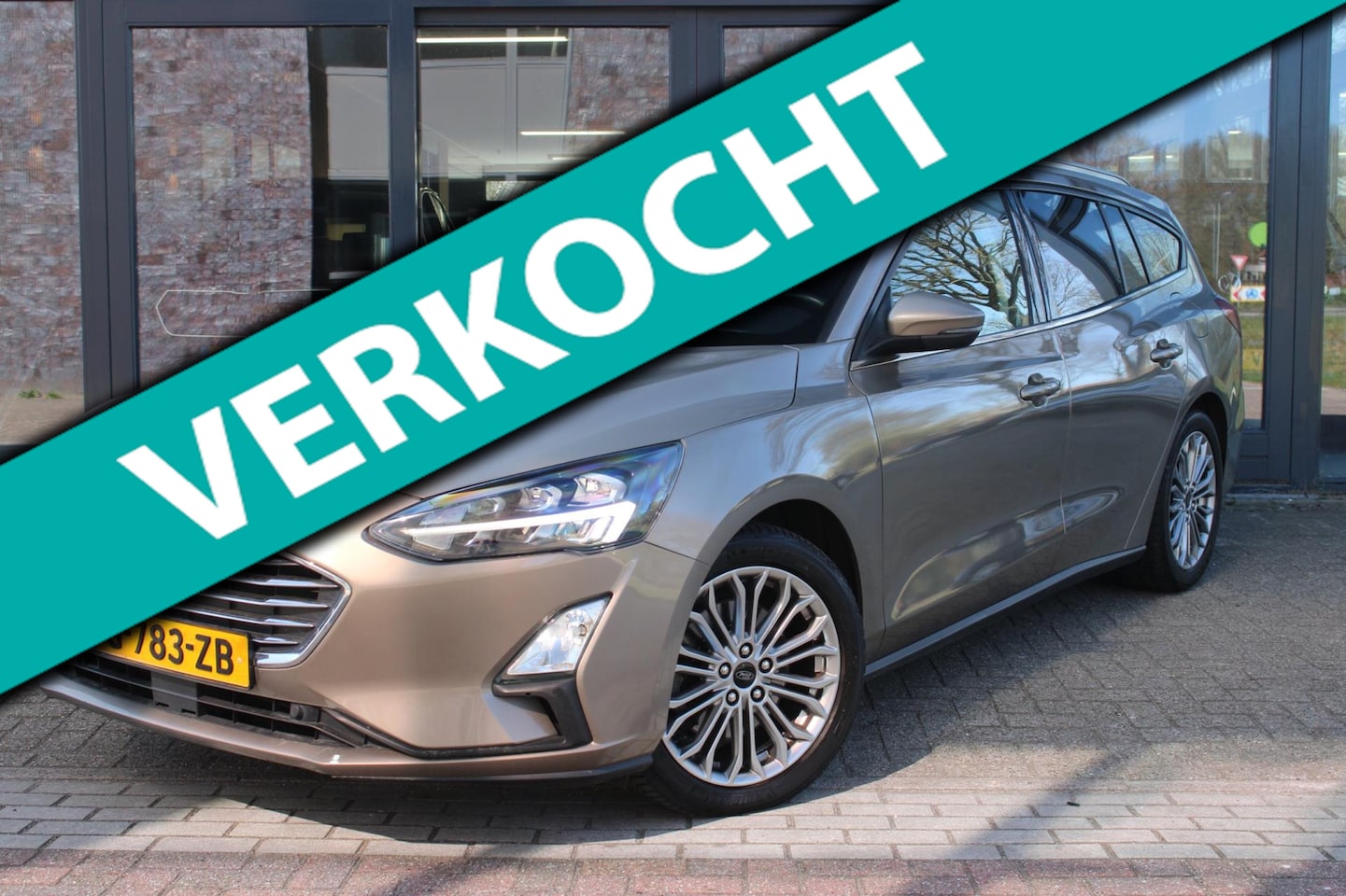 Ford Focus Wagon - 1.0 EcoBoost Titanium Business | Cruise Control | Carplay | Navigatie | Telefoonvoorbereid - AutoWereld.nl
