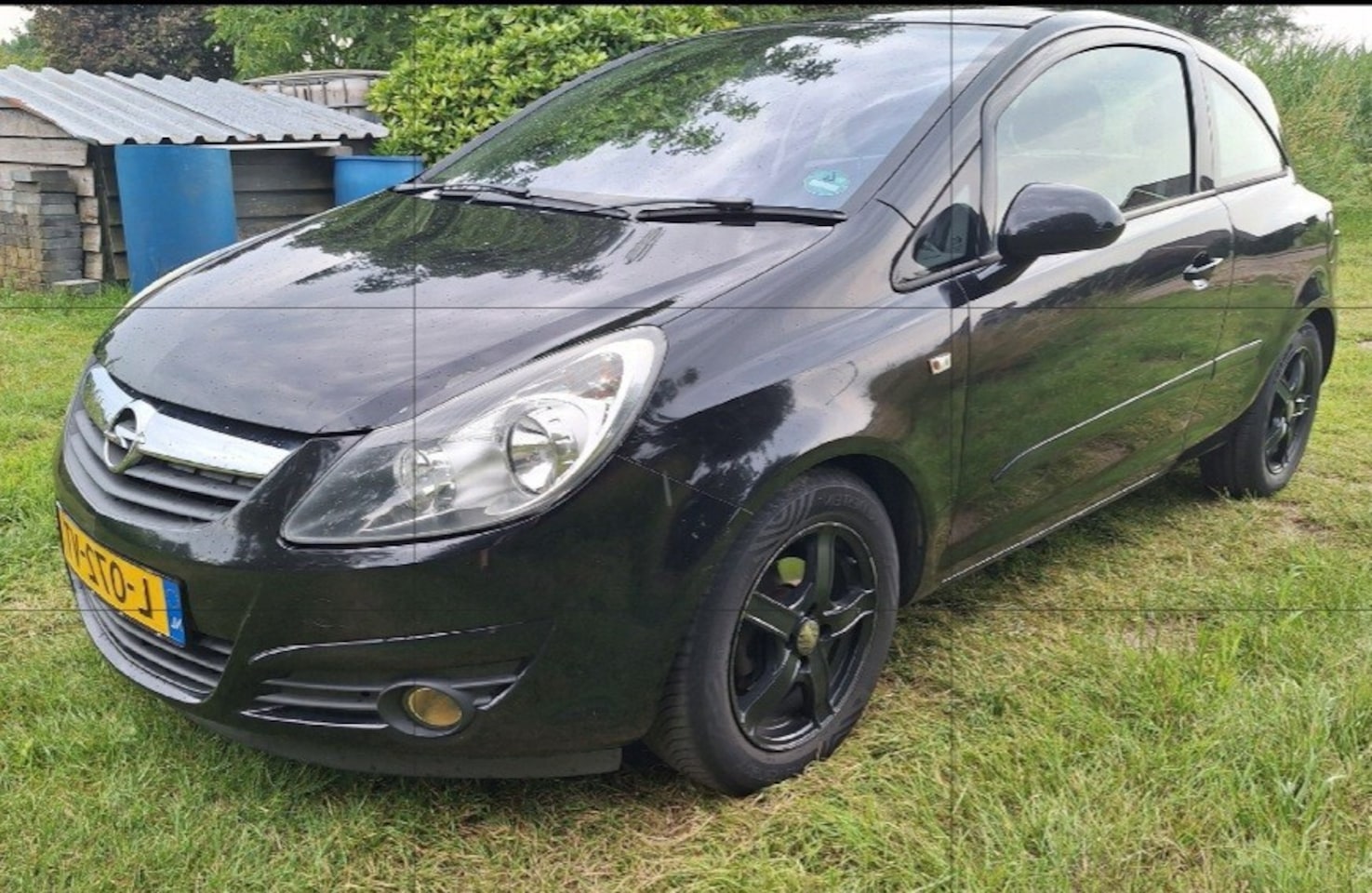 Opel Corsa - 1.4-16V Enjoy 1.4-16V Enjoy - AutoWereld.nl