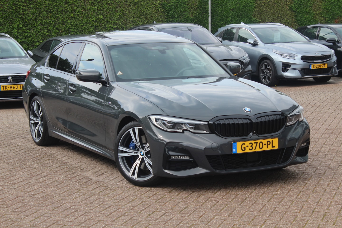 BMW 3-serie - 330i High Exe. / Schuifdak / 360Camera / Head-up / 19'' / Leder / Memory seats / Harman Ka - AutoWereld.nl