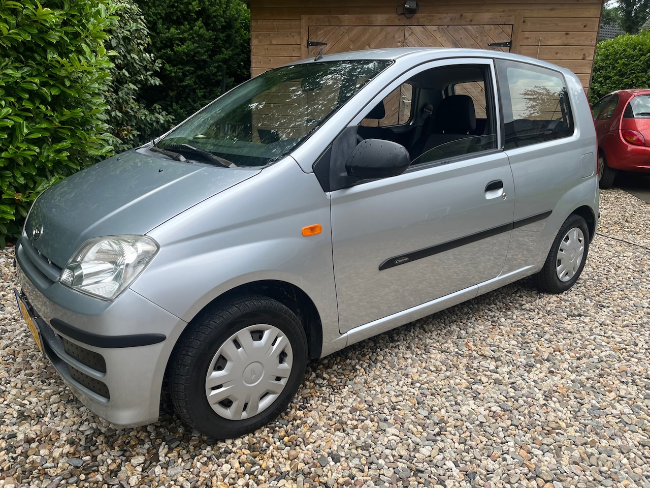 Daihatsu Cuore - 1.0-12V 100th Anniversary/direkt mee/apk/beurt/unieke km 46.915 km - AutoWereld.nl