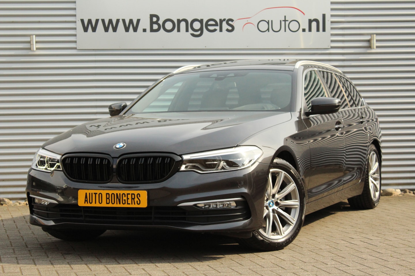 BMW 5-serie Touring - 520i High Executive Sport Line - AutoWereld.nl