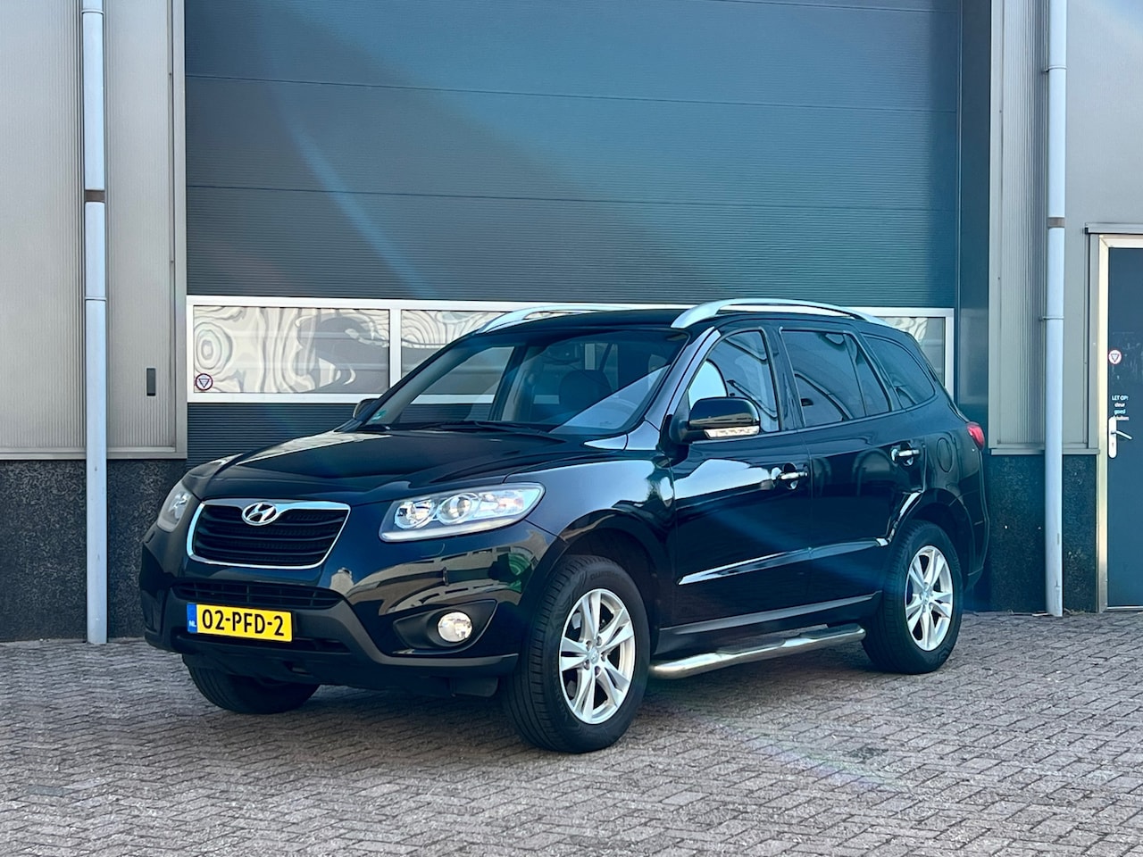 Hyundai Santa Fe - 2.4i CVVT 4WD Style bj.2011 Autom|Opendak|Navi|Trekhaak. - AutoWereld.nl