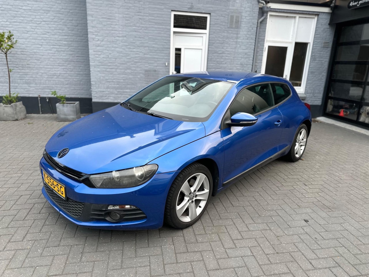 Volkswagen Scirocco - 1.4 TSI | NAVI | LEER | 160 PK | CLIMA | - AutoWereld.nl