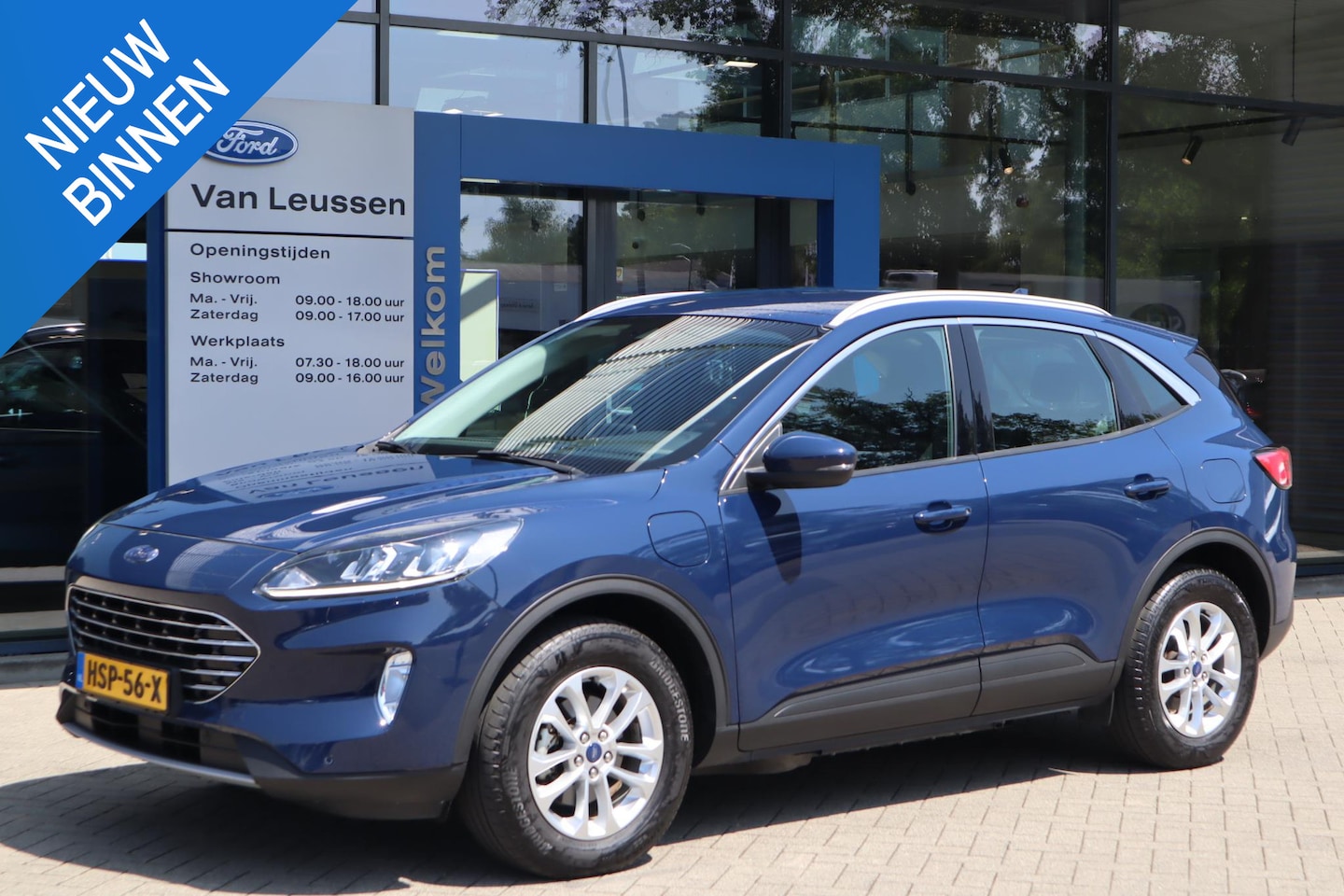 Ford Kuga - 2.5 PHEV TITANIUM APPLE/ANDROID PARK-SENSOREN CAMERA KEYLESS NAVI WINTERPACK - AutoWereld.nl