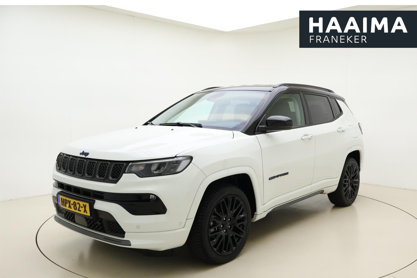 Jeep Compass - 4xe 240 Plug-in Hybrid Electric S | Navigatie | Lederen bekleding | Elektrische bedienbare - AutoWereld.nl