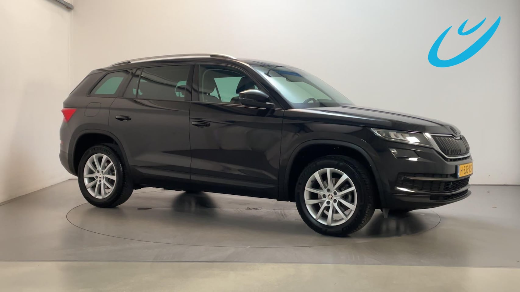 Skoda Kodiaq - 1.5 TSI 150pk DSG Business Edition Camera LED Trekhaak Sfeerverlichting Leder-Stof - AutoWereld.nl