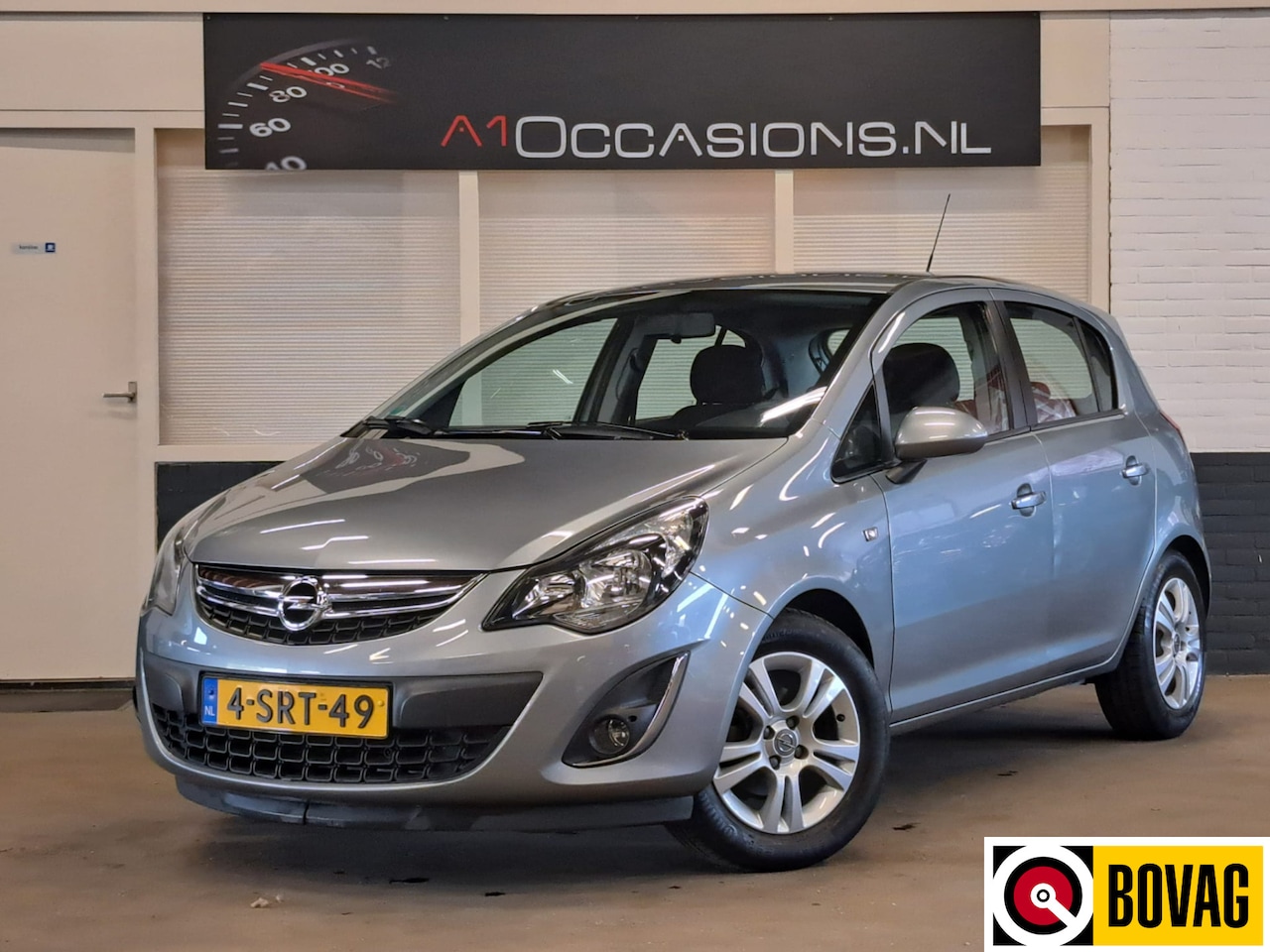 Opel Corsa - 1.4-16V Design Edition + STOEL-/STUURVERWARMING !! - AutoWereld.nl
