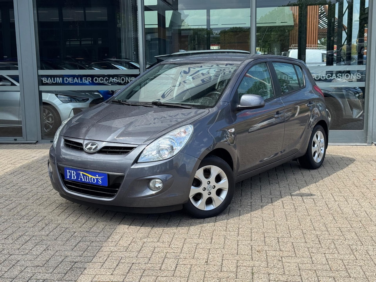 Hyundai i20 - 1.2i Black pack Airco Lmv - AutoWereld.nl