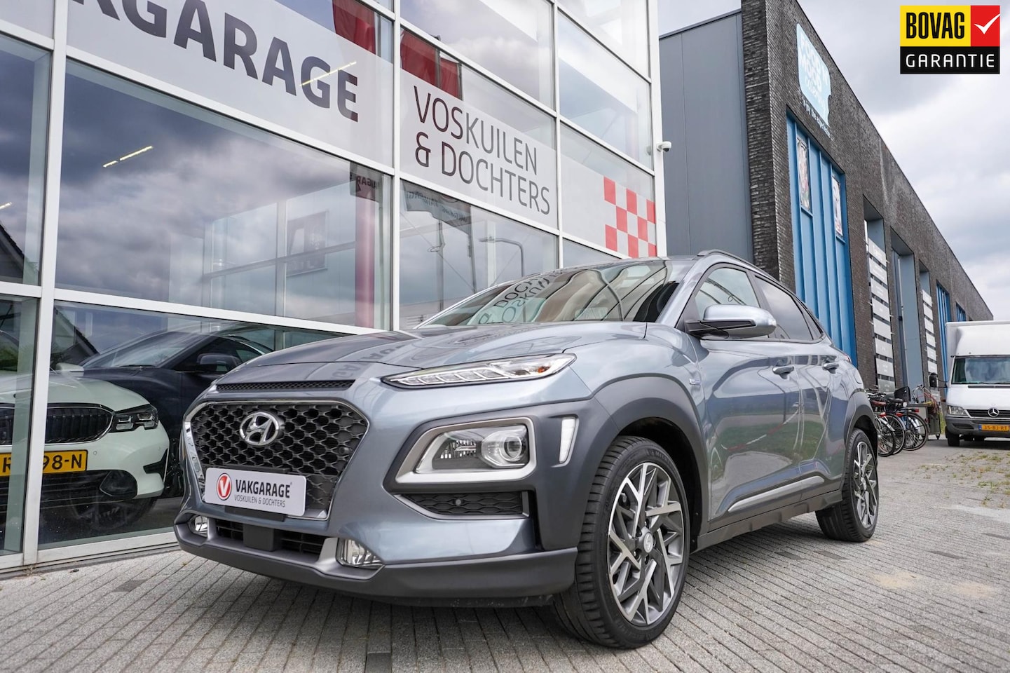 Hyundai Kona - 1.6 GDI HEV Premium Exellence |Camera | Leder - AutoWereld.nl