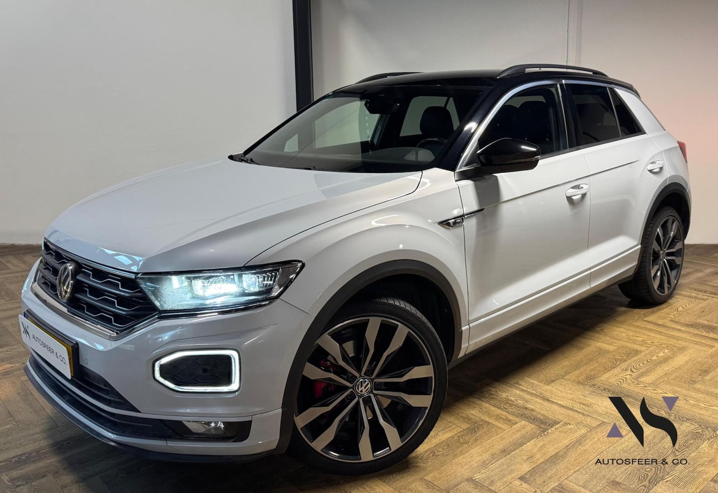 Volkswagen T-Roc - 1.5 TSI Sport Business R-Line CAM PDC - AutoWereld.nl