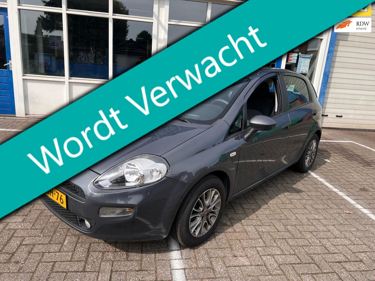 Fiat Punto Evo - 1.2i 4-Cilinder 5-deurs Airco Trekhaak 141.000km 2e eig. Historie - AutoWereld.nl