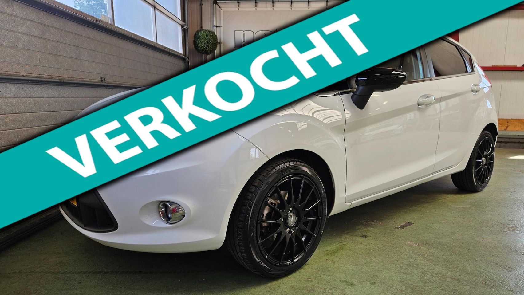 Ford Fiesta - 1.25 Titanium Cruise/Clima/Pdc - AutoWereld.nl