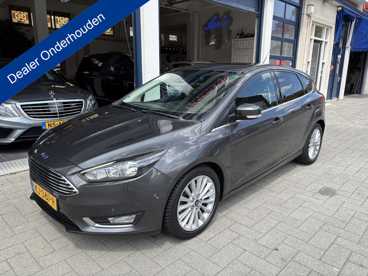 Ford Focus - 1.5 Titanium NL AUTO/DEALER OND./NAVI/CAMERA/DAK - AutoWereld.nl