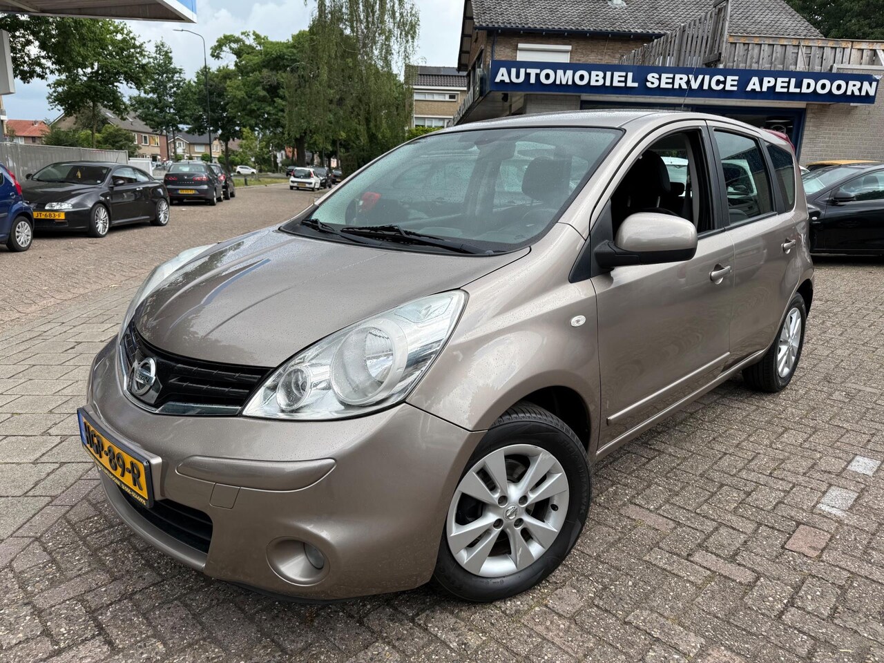 Nissan Note - 1.4 Acenta *NAVI*CLIMA*CRUISE*PDC*DIML. AUTOM.* - AutoWereld.nl