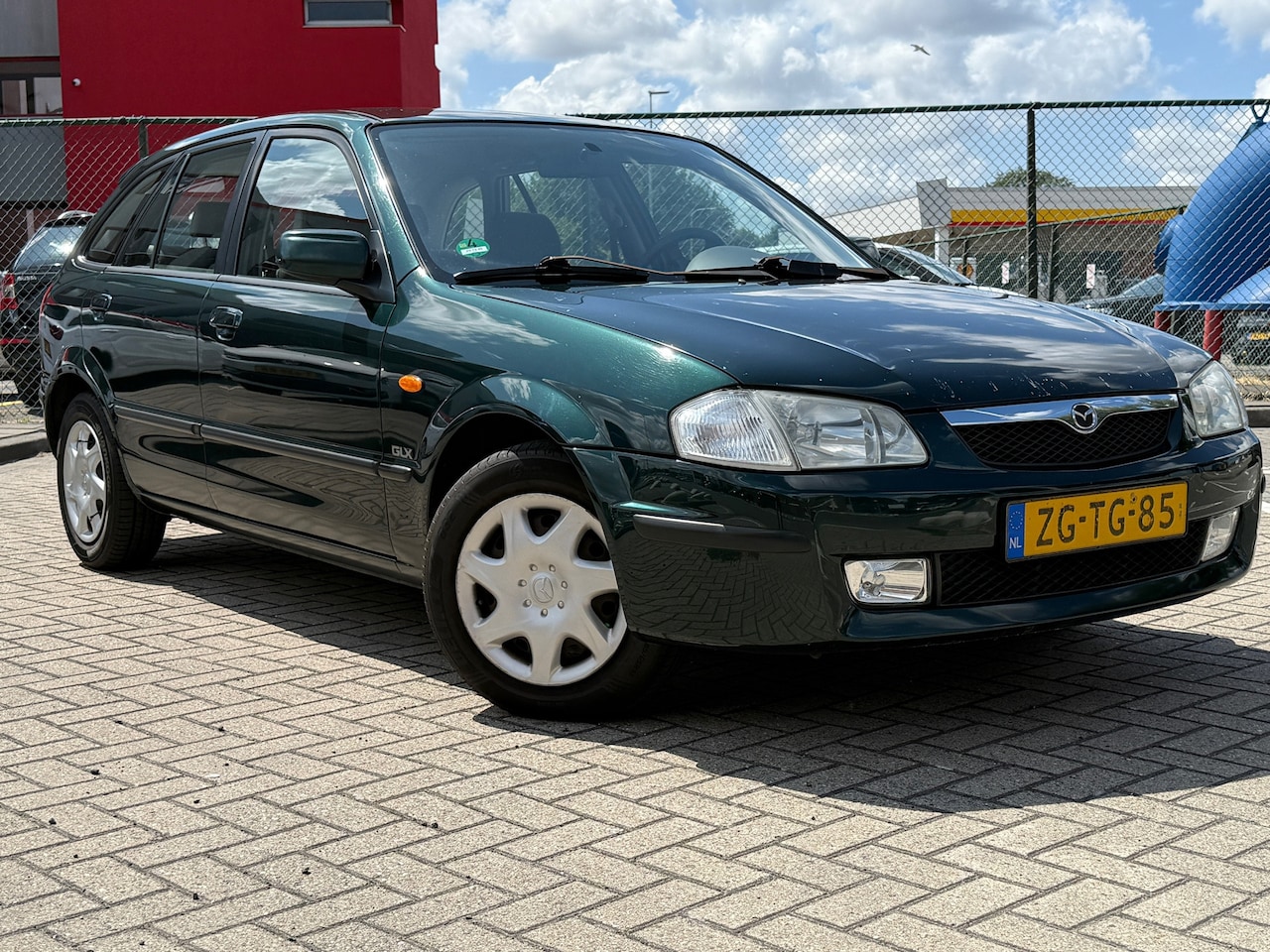 Mazda 323 Fastbreak - 1.5i GLX|5DRS|AIRCO|INRUILKOOPJE - AutoWereld.nl