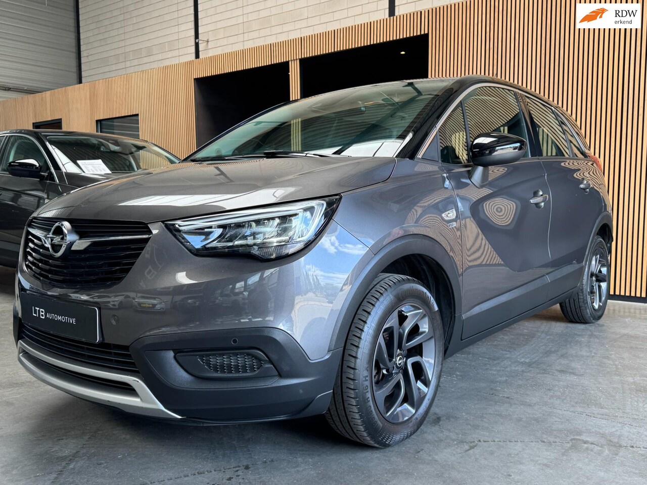 Opel Crossland X - 1.2 Turbo Innovation Camera|Carplay|Navi|Cruise|APK - AutoWereld.nl