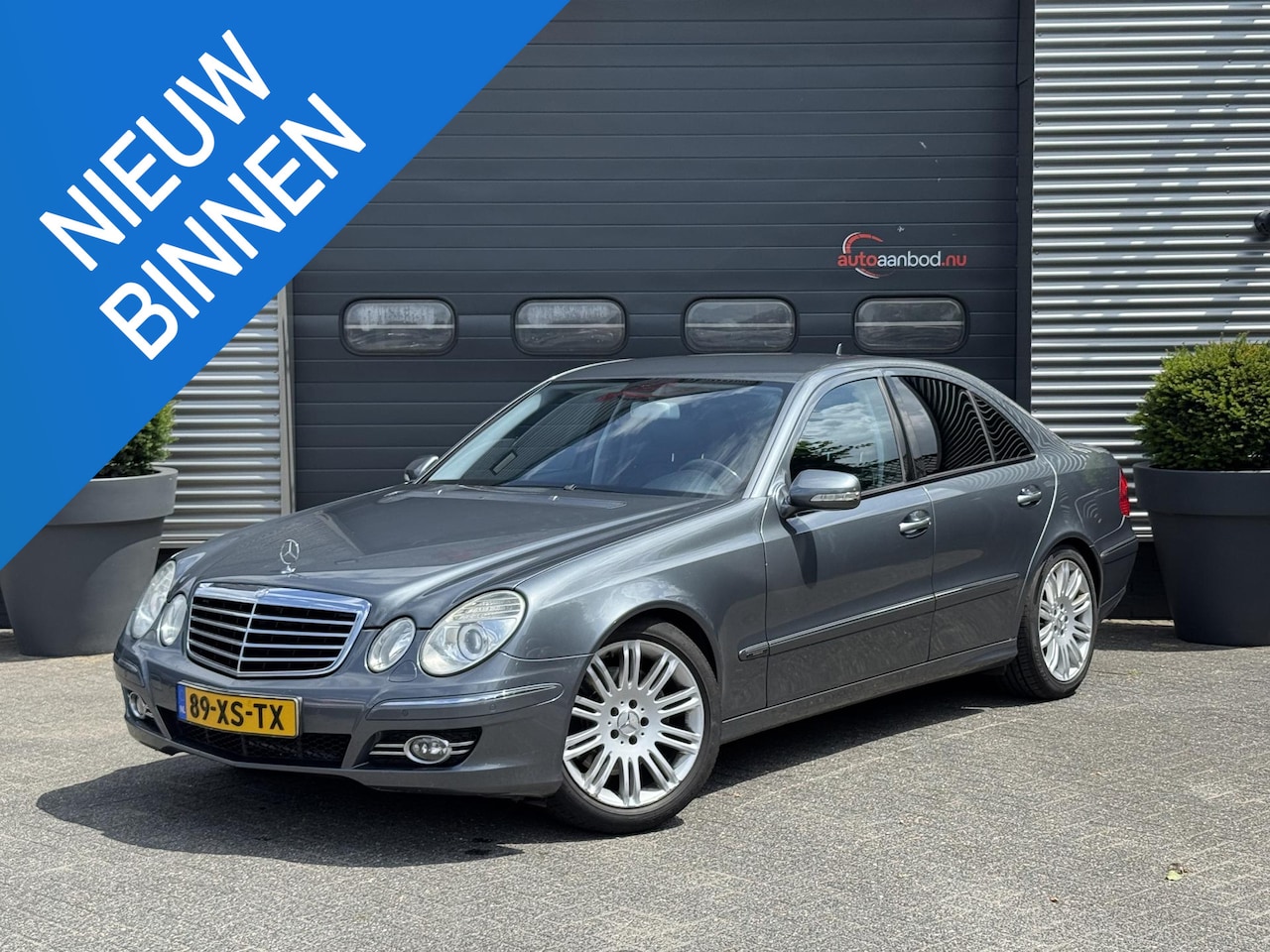 Mercedes-Benz E-klasse - 230 Avantgarde | Navigatie | Privacy Glass | Trekhaak | Climate Control | Lichtmetalen Vel - AutoWereld.nl