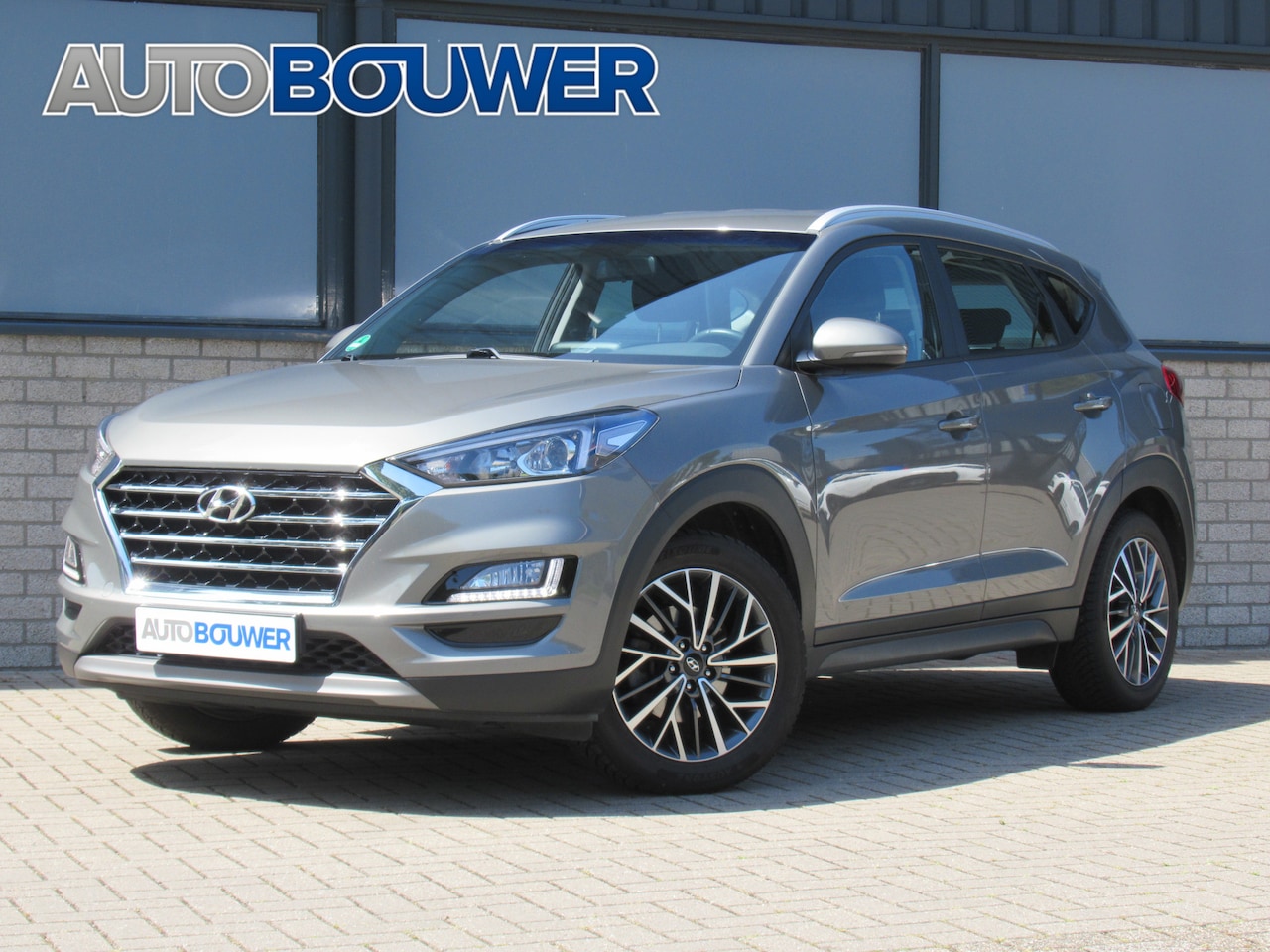 Hyundai Tucson - 1.6 T-GDI 177 PK Automaat 2e eigen | tr.haak | navi | camera | 18 "inch | stoel + stuur ve - AutoWereld.nl
