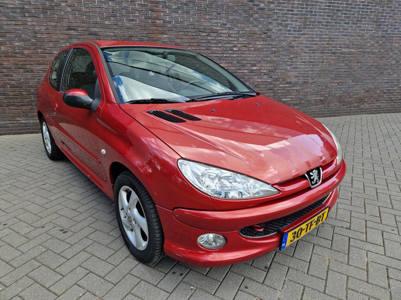 Peugeot 206 - 1.6-16V Air-line automaat airco trekhaak APK '26 - AutoWereld.nl