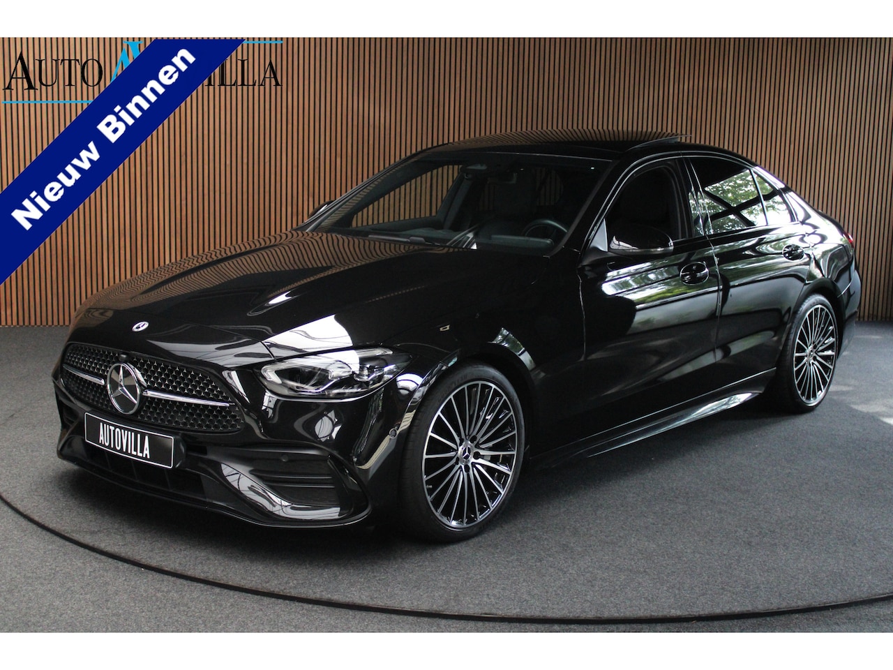 Mercedes-Benz C-klasse - 180 AMG Panodak Leer Camera  Nightpack Navi PTS Ambient LM velgen Afneemb. trekhaak - AutoWereld.nl