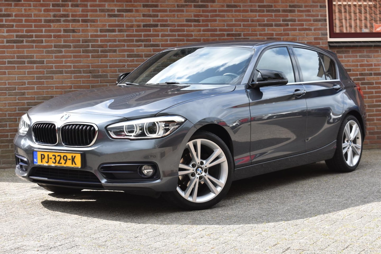 BMW 1-serie - 116d Corporate Lease Executive '17 LED Sport Navi Clima Cruise Inruil mogelijk - AutoWereld.nl