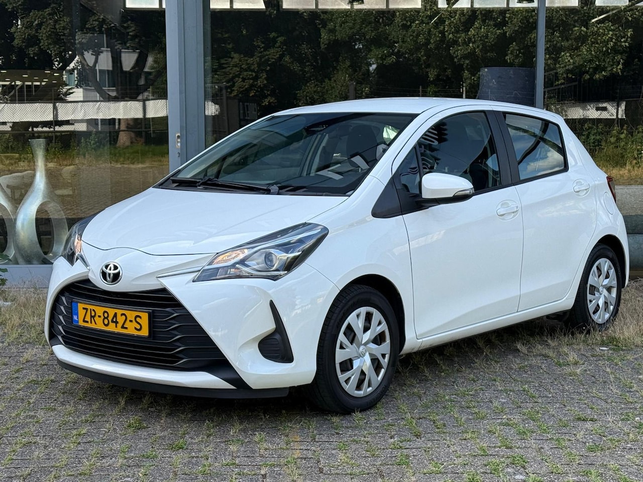 Toyota Yaris - 1.0 VVT-i Active Airco Nap Navi 1e Eigenaar - AutoWereld.nl