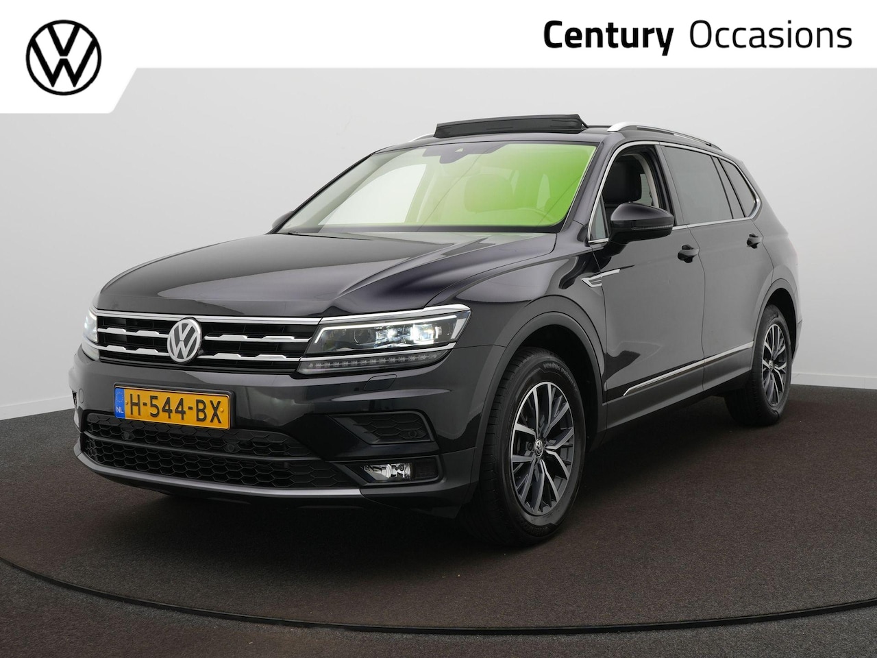 Volkswagen Tiguan Allspace - 1.5 TSI Comfortline Business 7p. DSG / Panoramadak / Trekhaak wegklapbr. / Navi / Parkeers - AutoWereld.nl