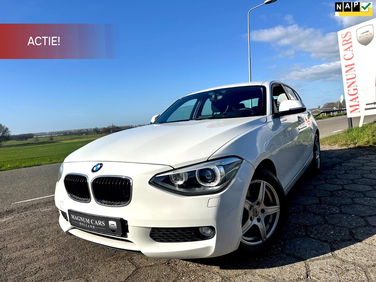 BMW 1-serie - 116i NAP 5D Airco Xenon Nw APK Navi Scherm Velgen Cruise Control - AutoWereld.nl