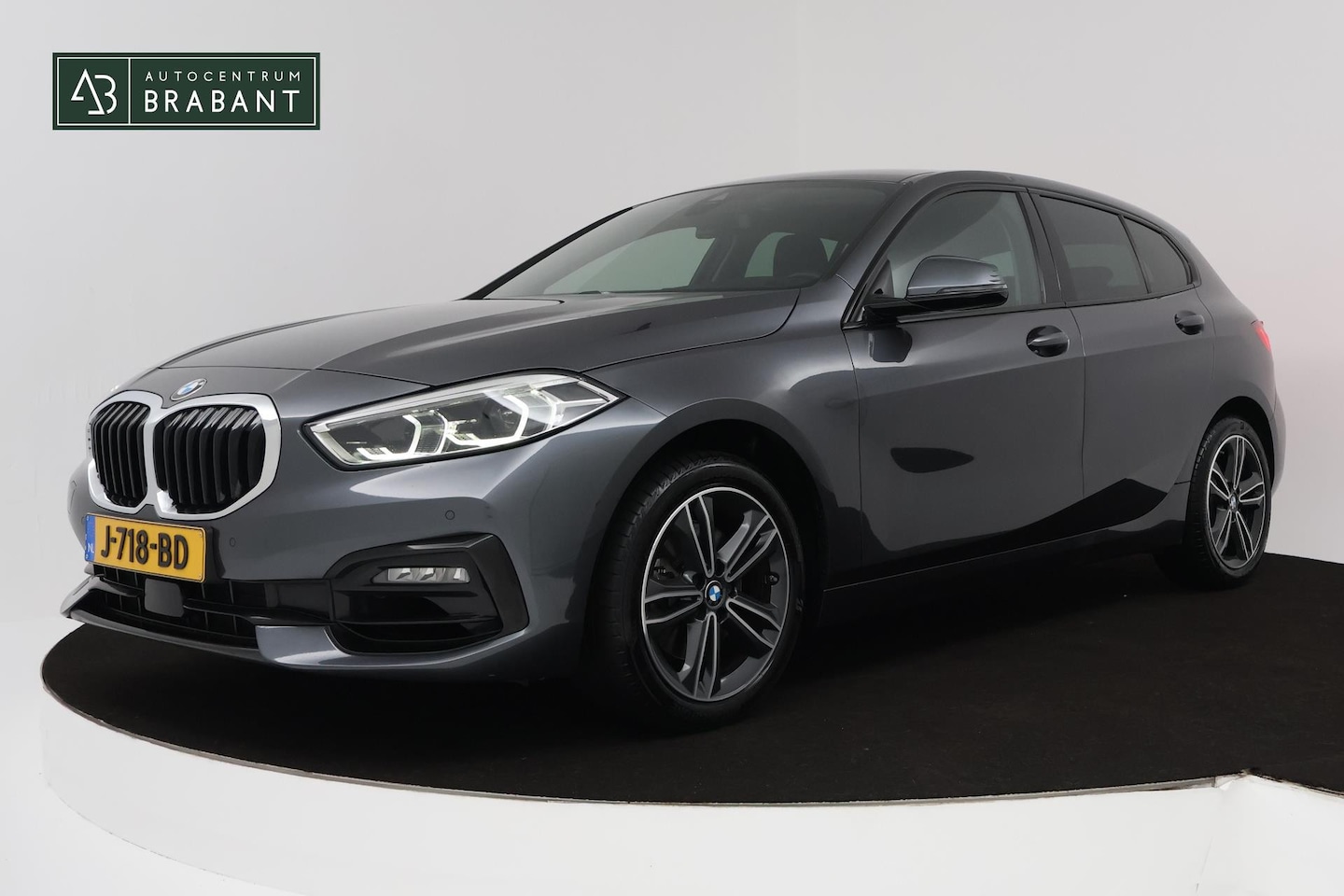 BMW 1-serie - 118i Executive Edition (PARKEERSENSOREN, NAVIGATIE, CRUISE CONTROL, PARKEERSENSOREN, NL-AU - AutoWereld.nl
