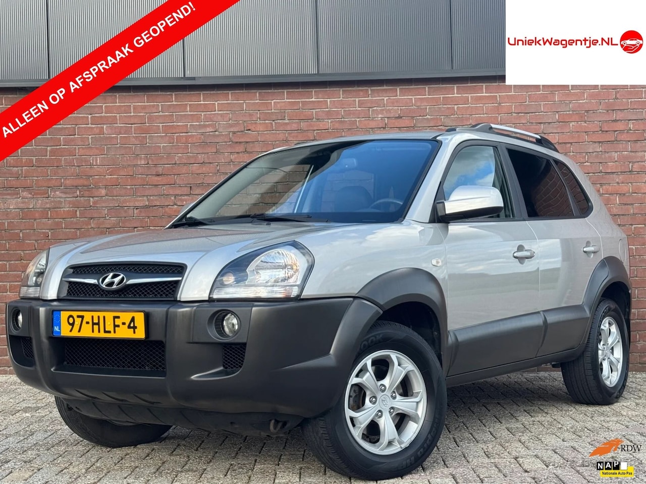 Hyundai Tucson - 2.7i V6 4WD | NL-AUTO! | LEDER! | TREKHAAK! - AutoWereld.nl