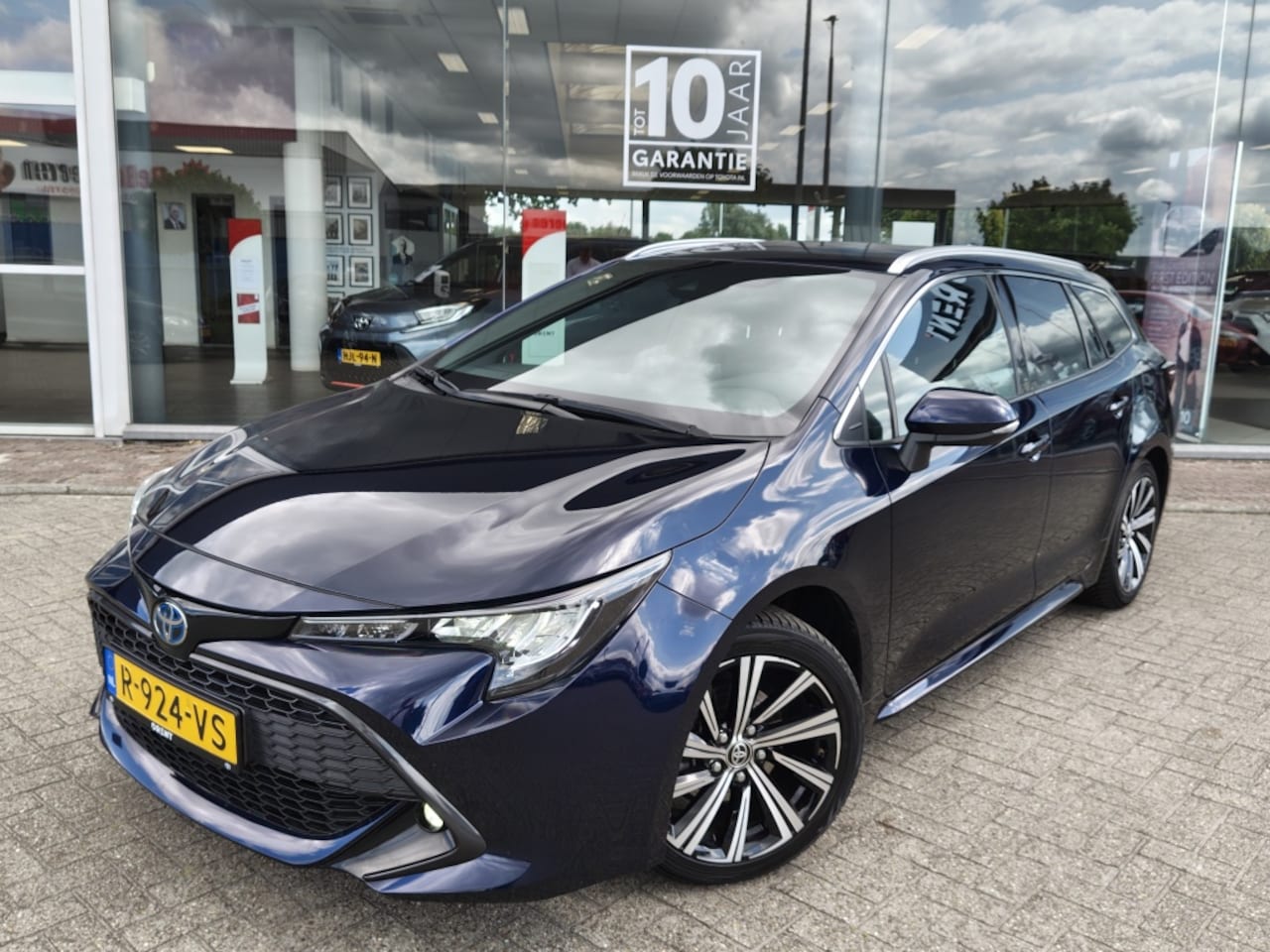 Toyota Corolla Touring Sports - 1.8 Hybrid Dynamic | Trekhaak Afneembaar | Navi | Stoelverwarmin - AutoWereld.nl