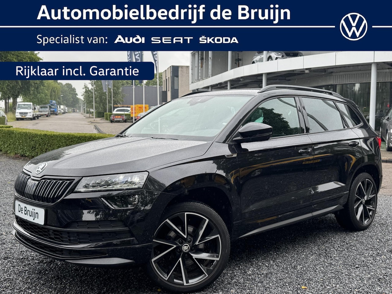 Skoda Karoq - 1.5 TSI 150pk DSG 4x4 Sportline (Trekhaak,Camera,Navi,Carplay) - AutoWereld.nl