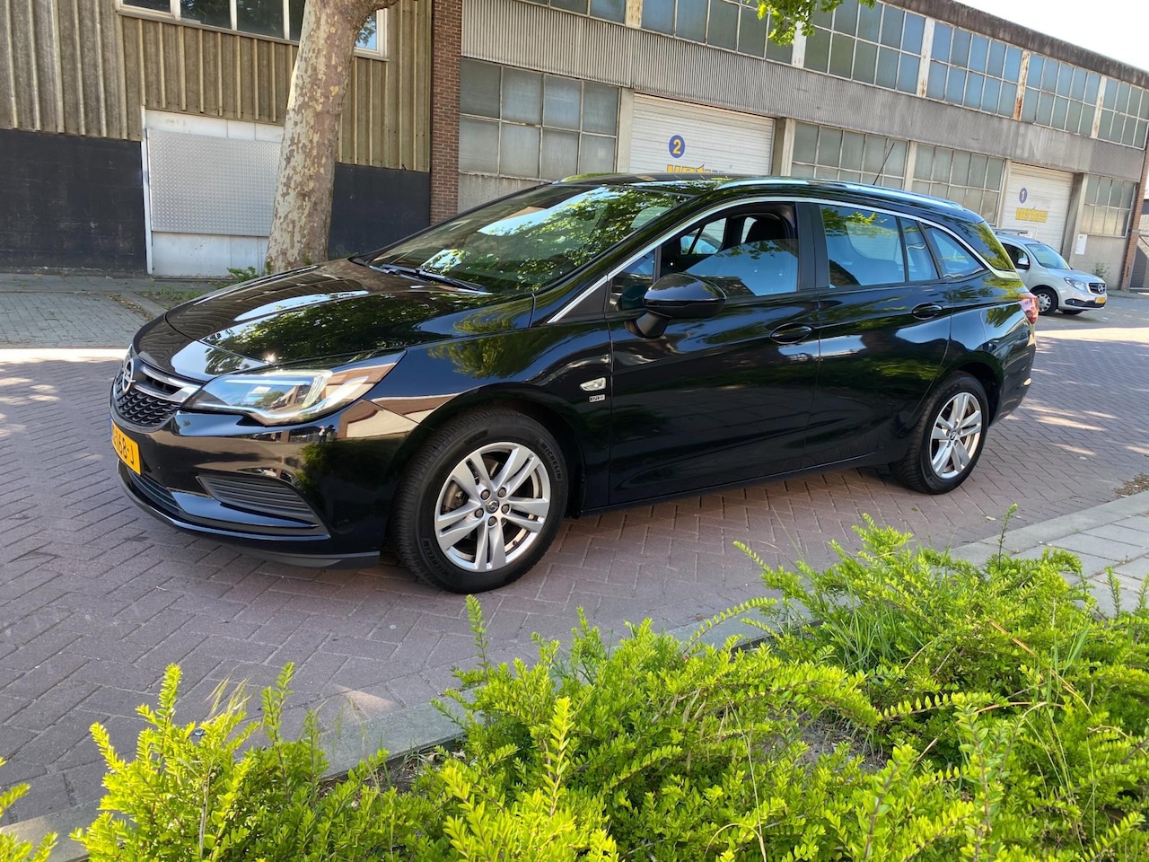 Opel Astra Sports Tourer - 1.4 Turbo 120 Jaar Edition * 2019 *Airco *Navigatie *Cruise Control *Automaat *APK 3-3-202 - AutoWereld.nl