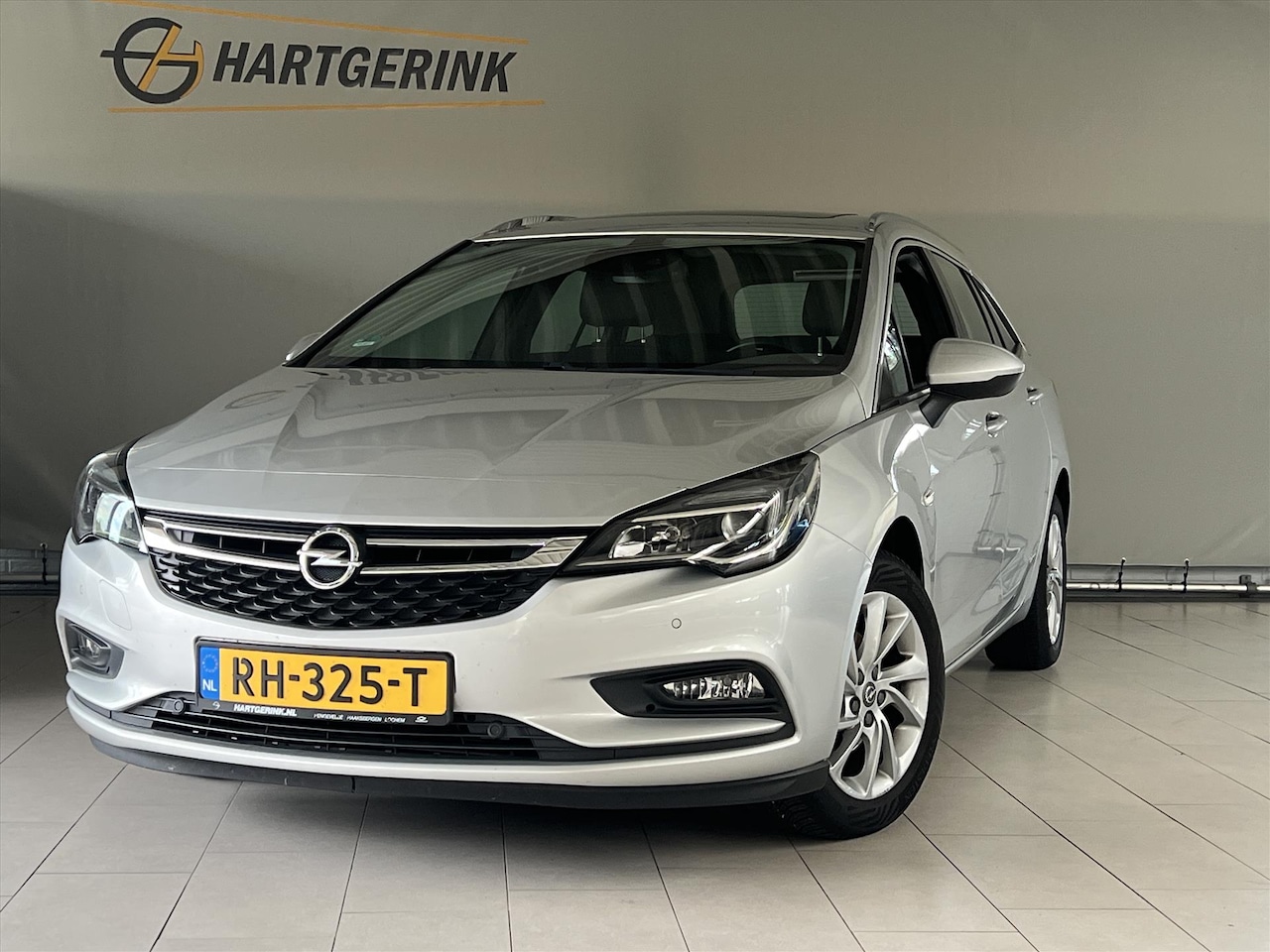 Opel Astra Sports Tourer - 1.4i T 150pk Innovation *Navi/Camera/Electr.achterklep* - AutoWereld.nl
