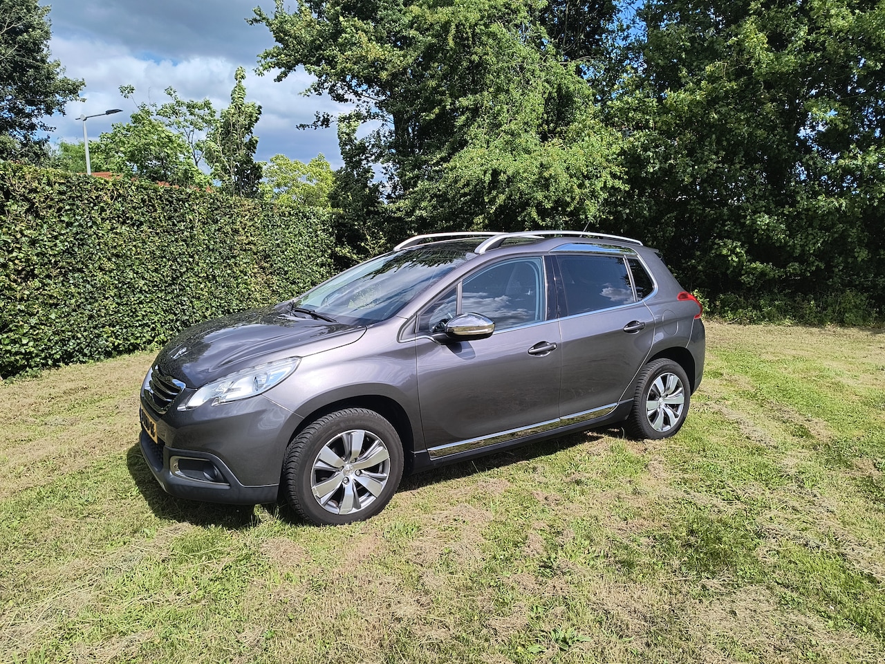 Peugeot 2008 - 1.2 PureTech Allure - AutoWereld.nl