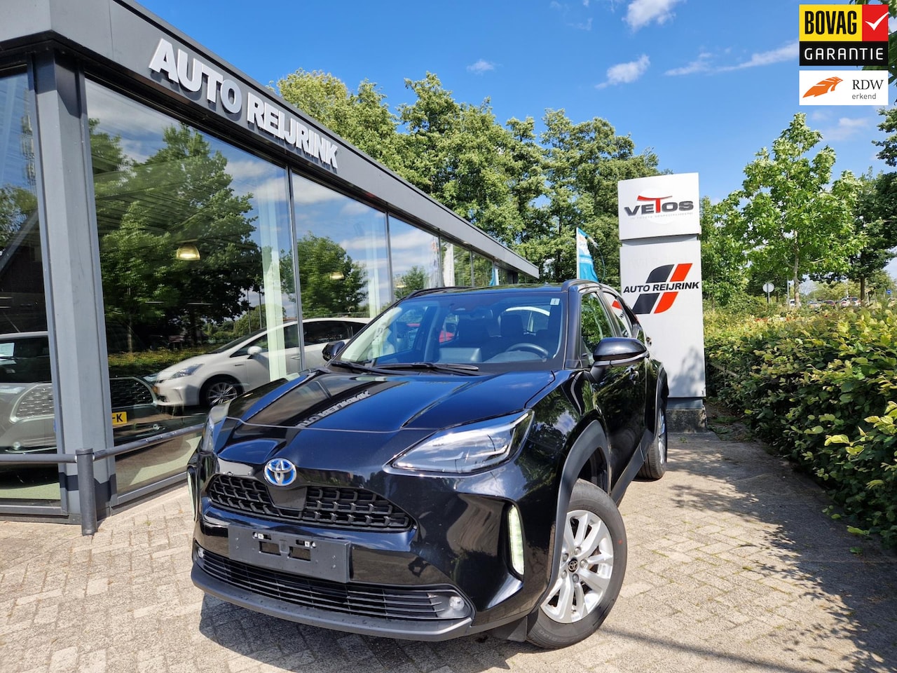 Toyota Yaris Cross - 1.5 Hybrid Active NAVI/KEYLESS/STOEL-EN STUURVERWARMING/ELECTR A-KLEP/HUD - AutoWereld.nl