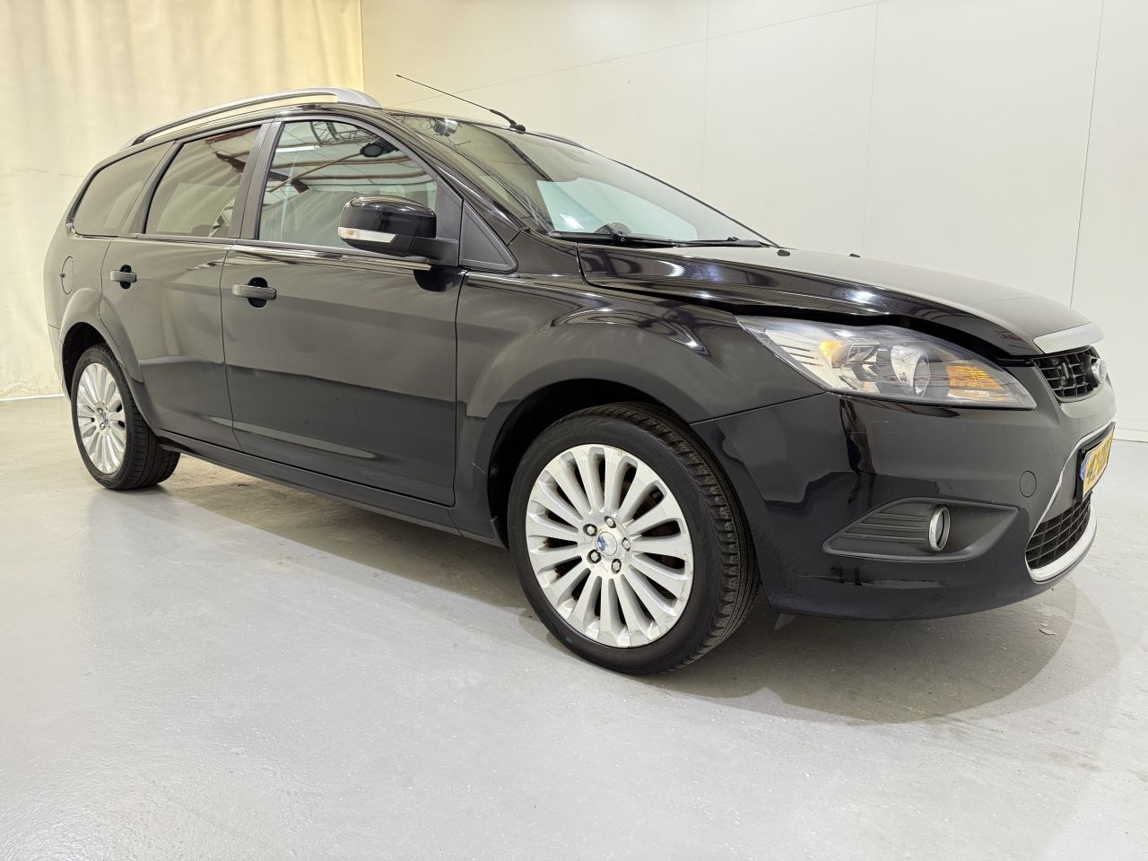 Ford Focus Wagon - 1.8 Flexifuel Titanium - AutoWereld.nl
