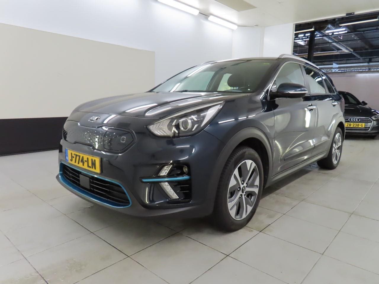 Kia e-Niro - DYNAMICLINE 64KWH 3 FASE/ACARPLAY/HLEER/NAV/FABRIEKSGARANTIE - AutoWereld.nl